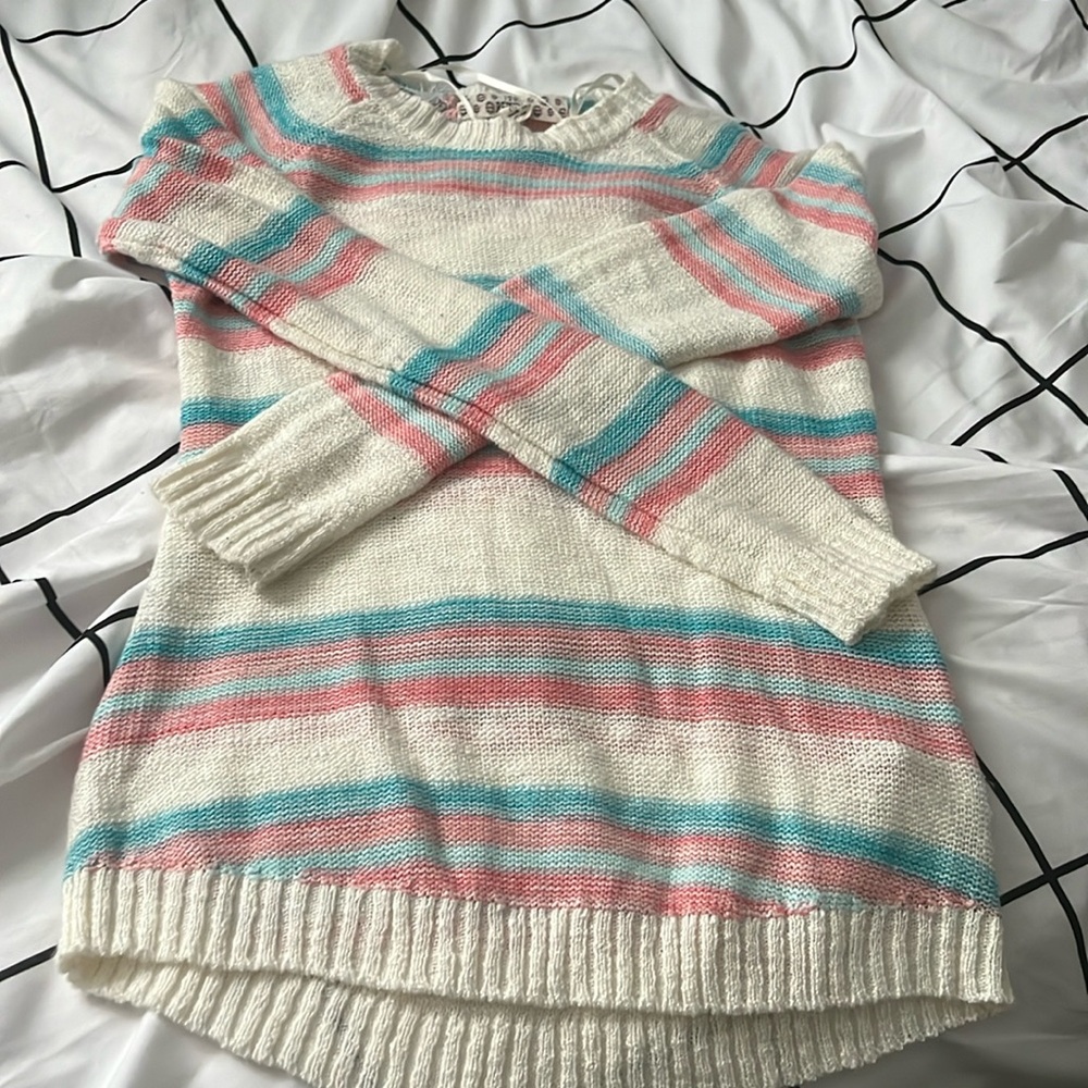 This is a pretty “beach” coverup! I would wear this under my bathing suit!